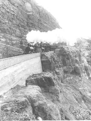 Steam train climbs Glenbrook gorge, Blue Mountains.